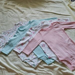 Brand new long sleeve onsie's